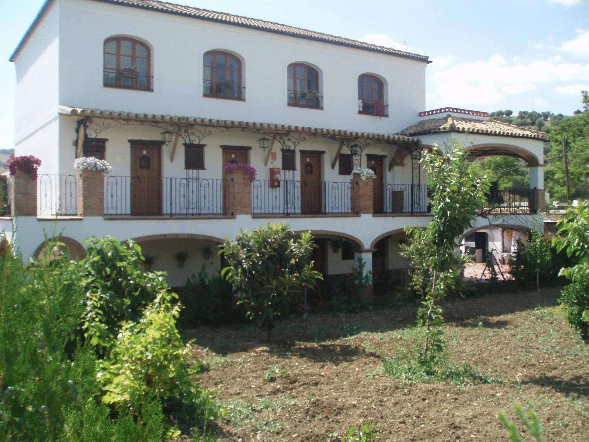 אל בוסקה Hotel Enrique Calvillo מראה חיצוני תמונה